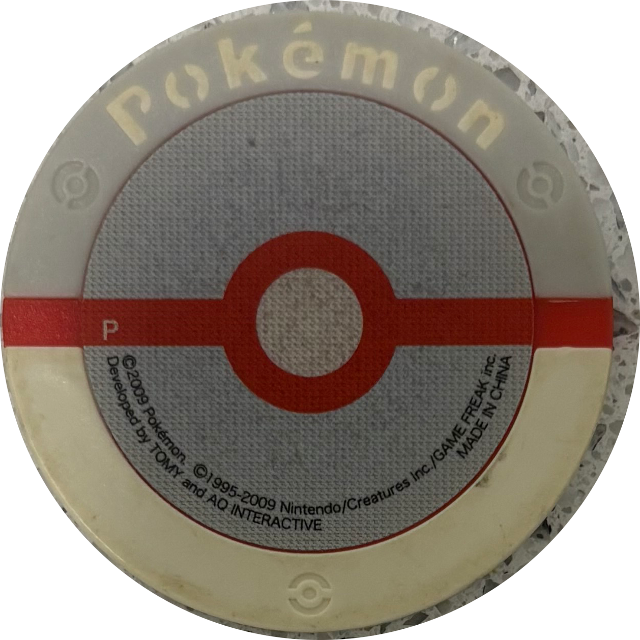 Plusle collectible #022, Pokemon Battrio Promotional Disks - P Checklist, back