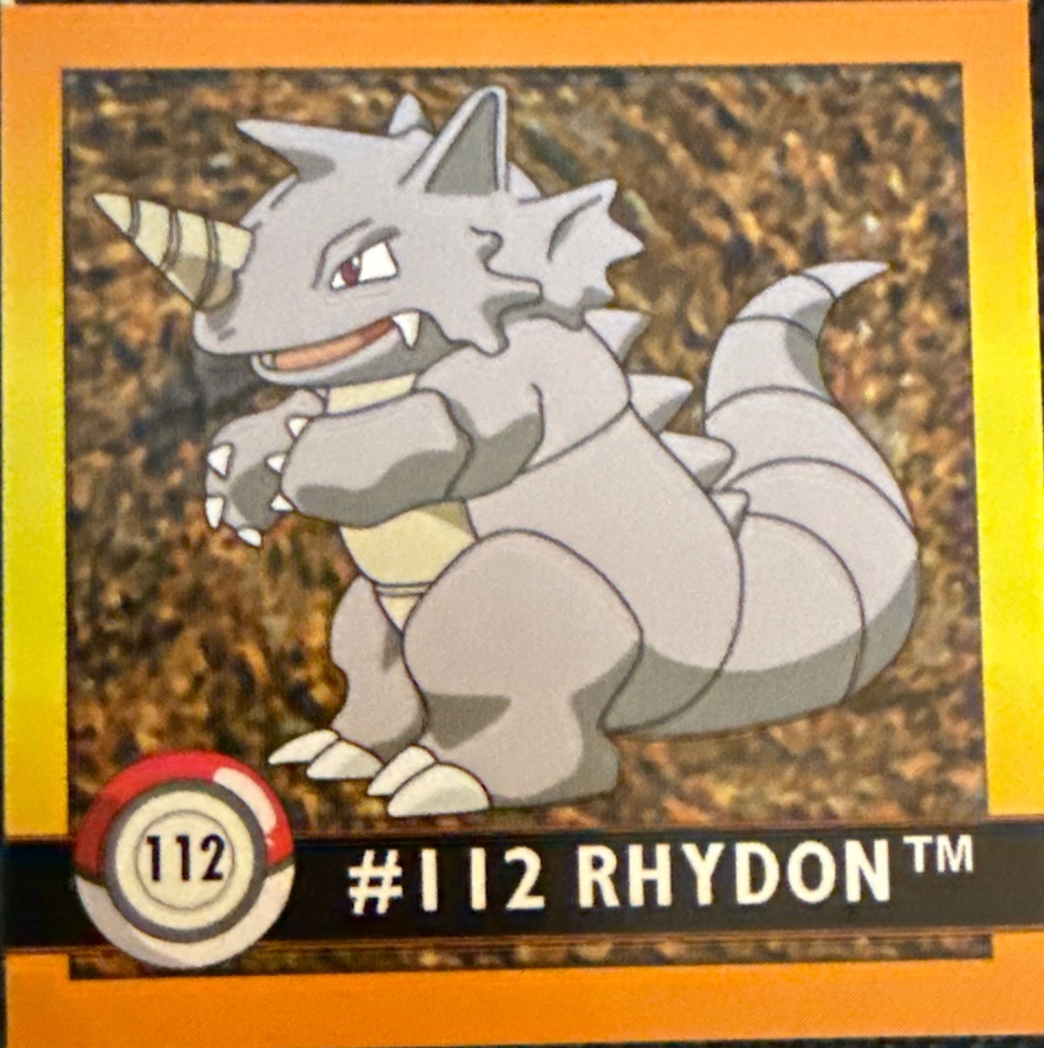 Rhydon sticker #112, Artbox (USA) Pokémon Artbox Stickers (1999), front
