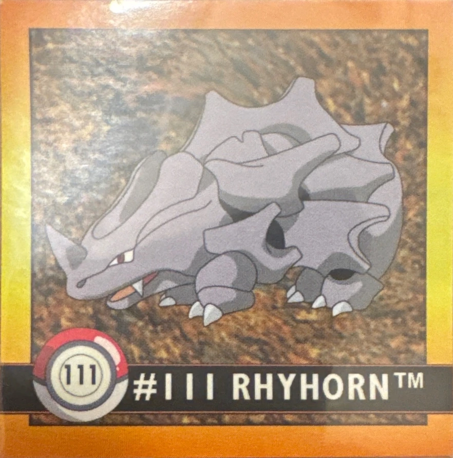 Rhyhorn sticker #111, Artbox (USA) Pokémon Artbox Stickers (1999), front